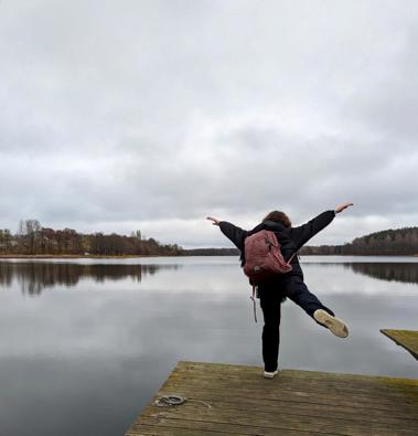 Nicole standing next to a lake